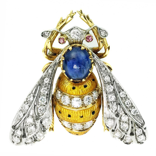 Eighteen-karat diamond and enamel ‘Bee’ brooch, centered by one oval cabochon sapphire. Estimate: $2,000-$4,000. A.B. Levy’s image.